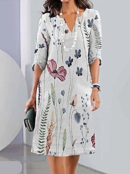 Velina | Vestido mini con estampado floral y escote en V