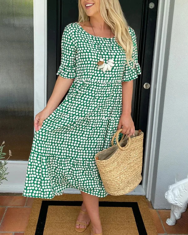 Estrella | Vestido midi relajado con lunares y manga corta