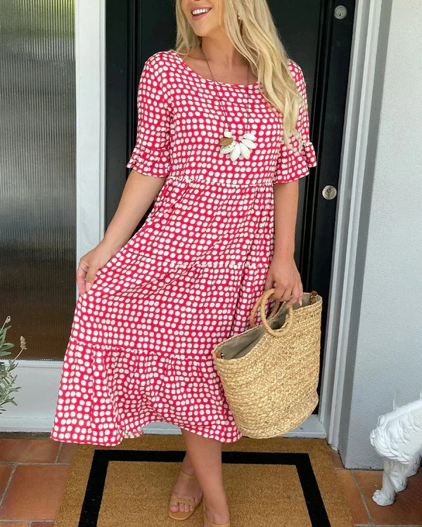 Estrella | Vestido midi relajado con lunares y manga corta